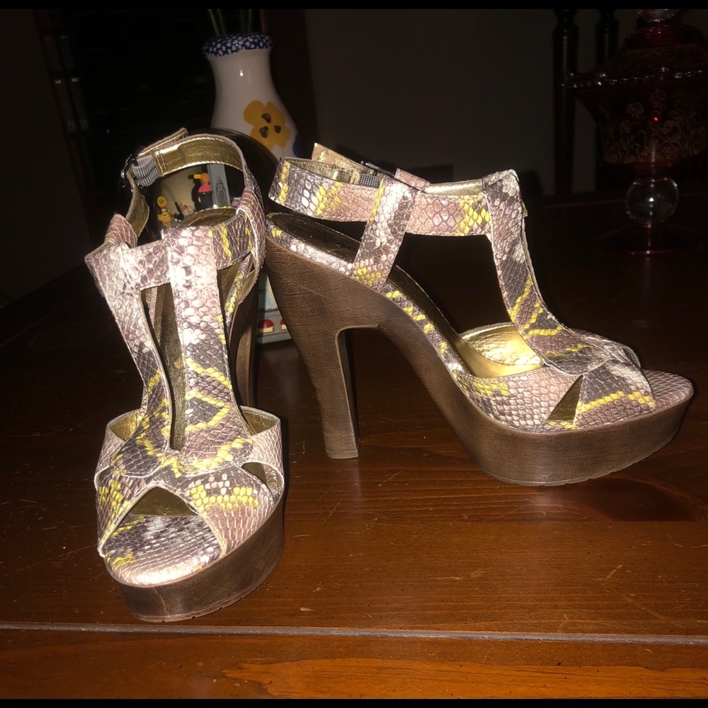Carlos Santana snake skin platforms.